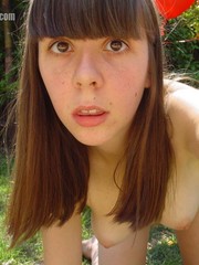 Chubby red teen lydia loves to get naked in her garden and t expose her shaggy snatch