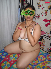 Masked amateur indian milf in a white bra rubbing her slit
