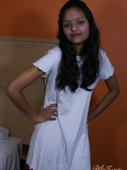 Alluring amateur indian teen in a white night robe wants to show you her firm body
