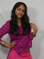 Slim indian girl in a pink shalwar kamiz and rose lingerie