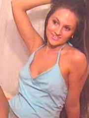 Hot long-haired bitch in blue takes off her clothes to show you her delights